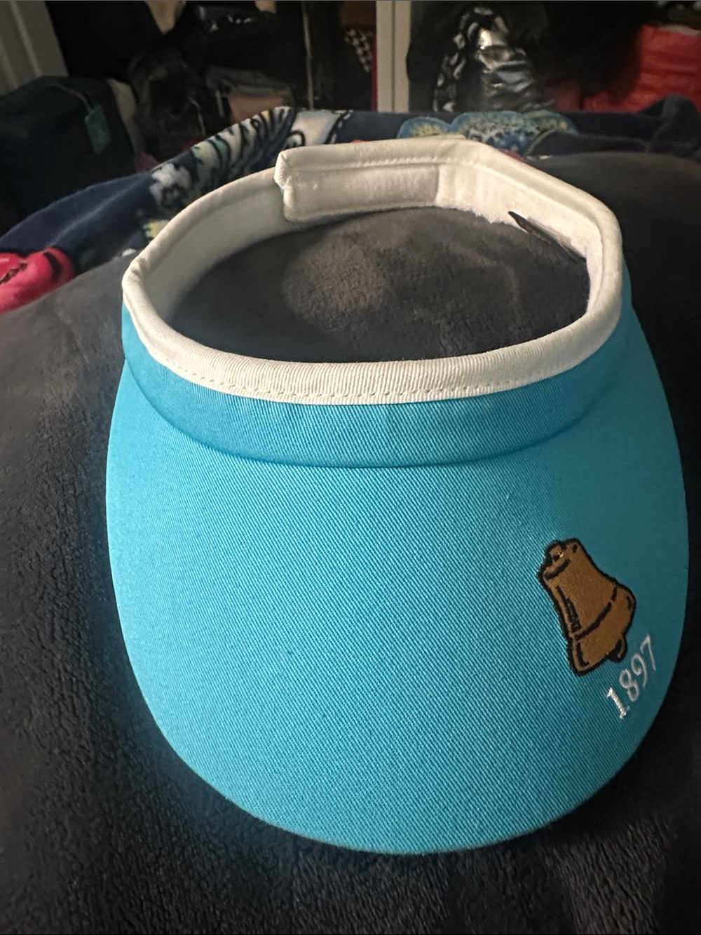 Aqua Blue Visor with Embroidered Bell Accent